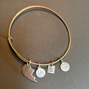 Alex and Ani Silver Charm Bracelet featuring the word “Best”.